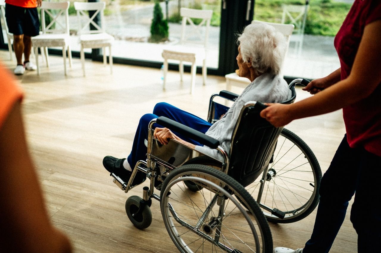 Mastering the First Impression: Your intriguing post title goes here A caregiver assists a senior adult in a wheelchair at a nursing home in Prague, Czech Republic.